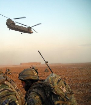Maj Doyle (right) waits for the helicopter to lift off after the Western Dashte drop off during Op Tora Ghar 9.
