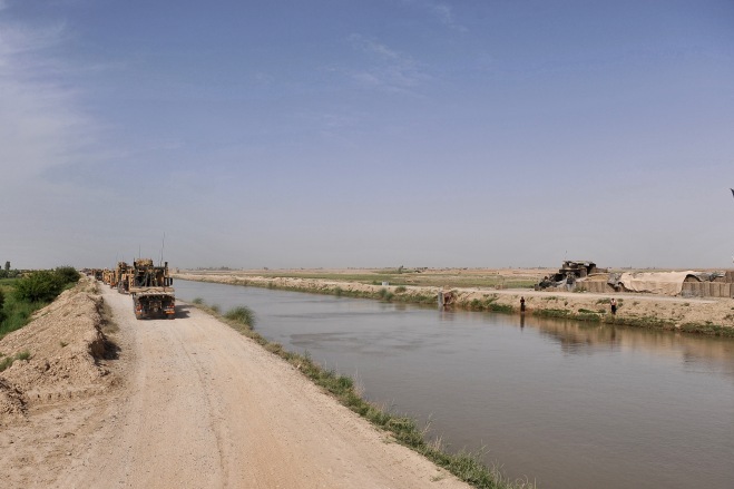 Vehicles make their way through Helmand Province.