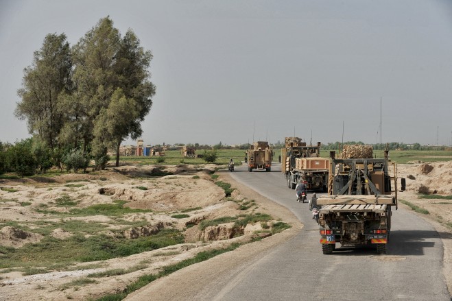 Vehicles make their way through Helmand Province.