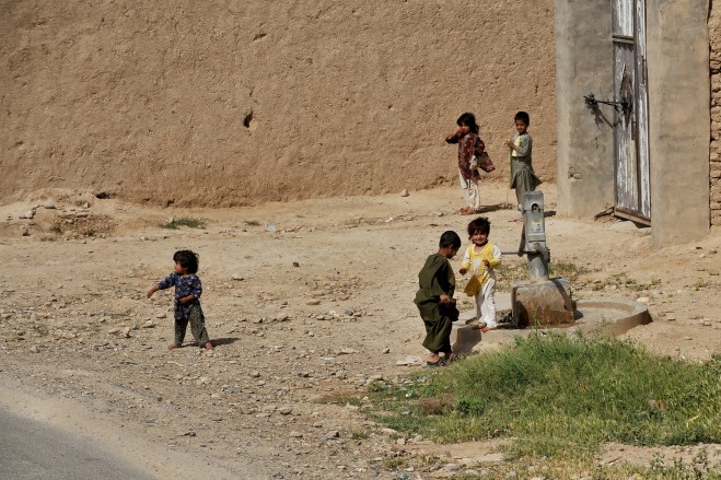 A child shows interest in the Combat Logistic Patrol.